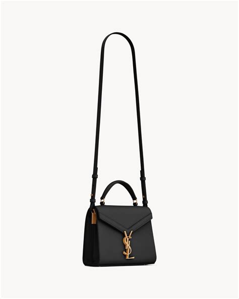 Cassandra Mini Top Handle Bag in Grain De Poudre Embossed .